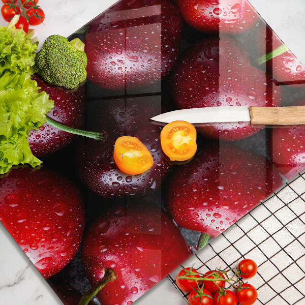 Tabla de cortar de vidrio Primer plano de cerezas