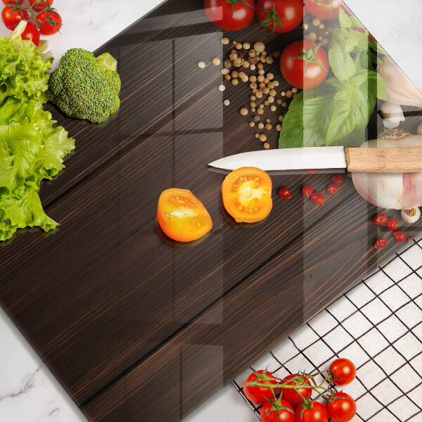 Tabla de cortar de vidrio Verduras en la mesa