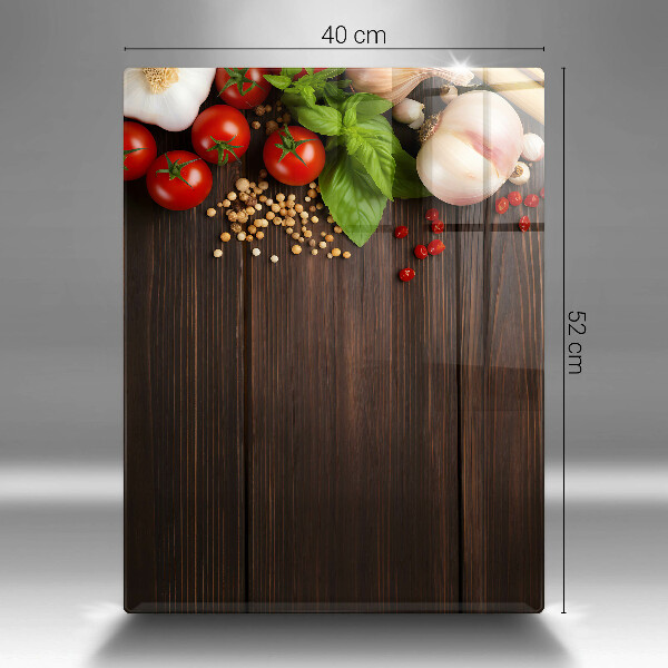 Tabla de cortar de vidrio Verduras en la mesa