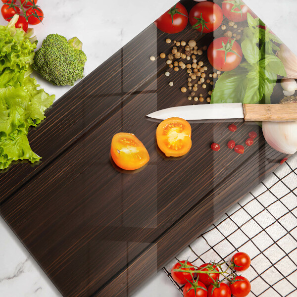 Tabla de cortar de vidrio Verduras en la mesa