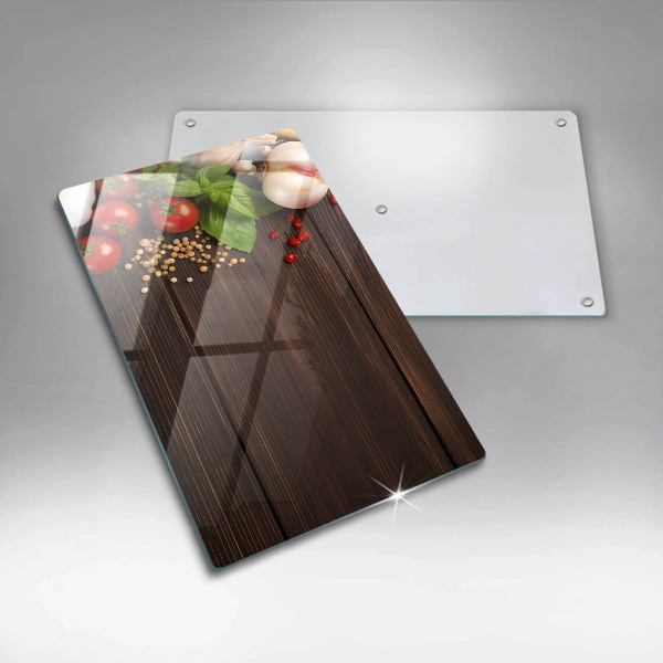 Tabla de cortar de vidrio Verduras en la mesa