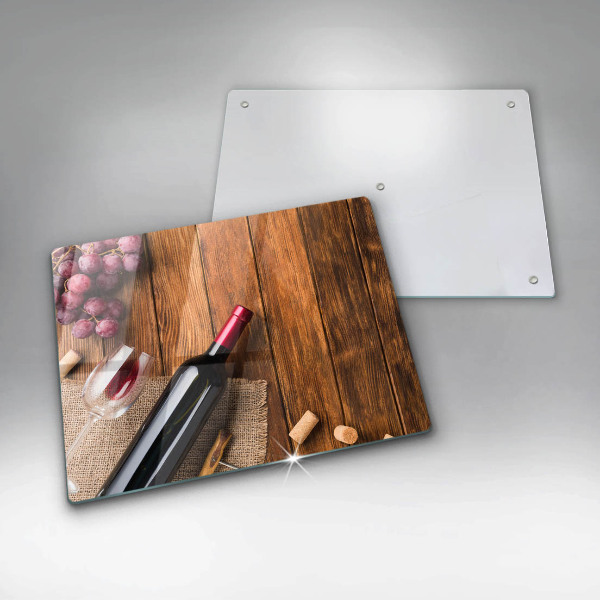 Tabla de cortar de vidrio Una botella de vino tinto