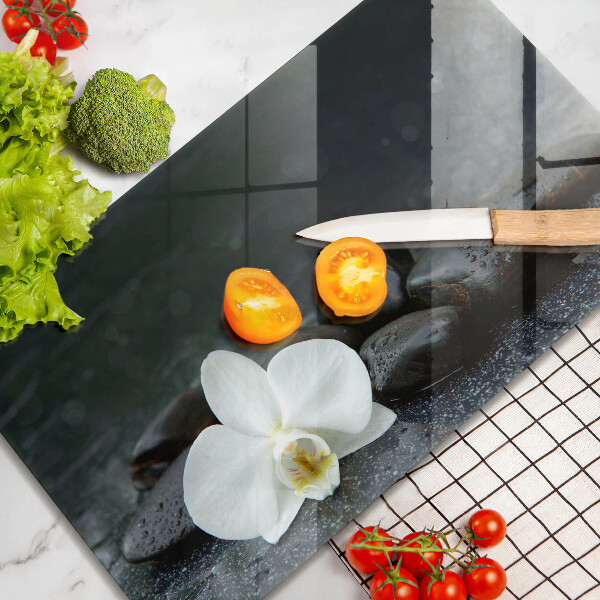 Tabla de cortar de vidrio Piedras zen de flor blanca