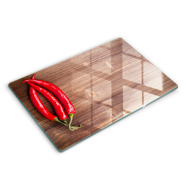 Tabla de cortar de vidrio Chiles sobre madera