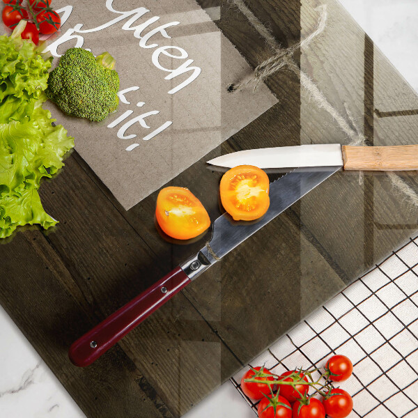 Tabla de cortar de vidrio Inscripción guten appetit sobre tablas de madera