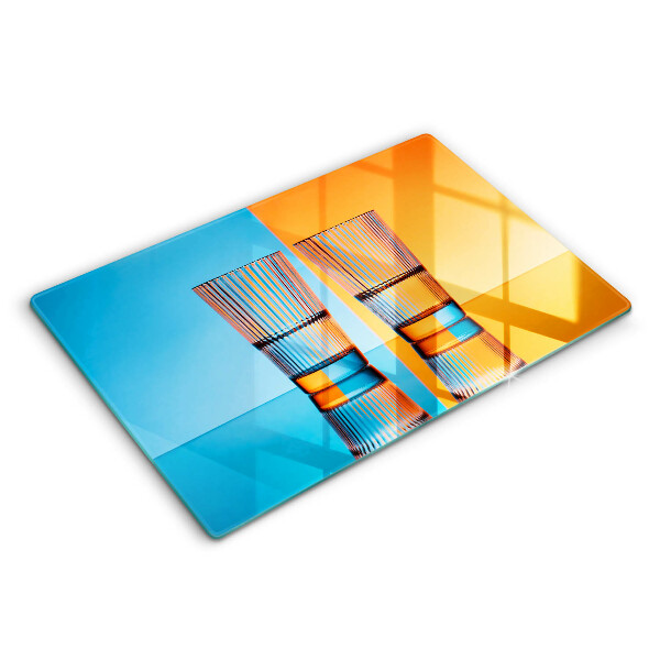 Tabla de cortar de vidrio Dos vasos de agua