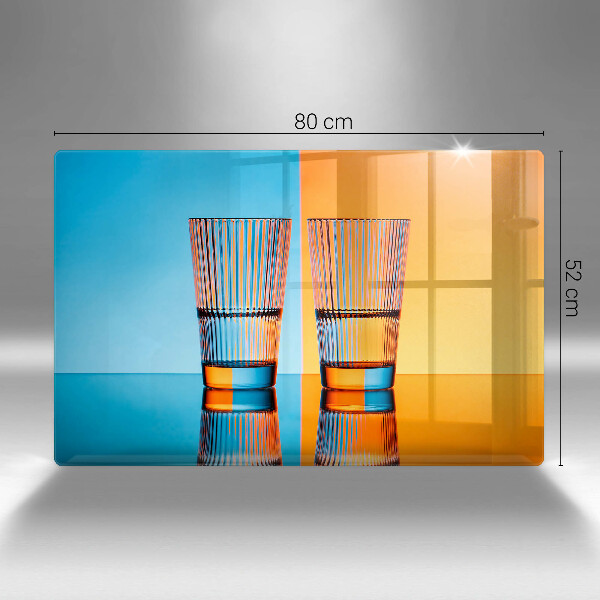 Tabla de cortar de vidrio Dos vasos de agua