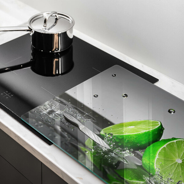 Tabla de cortar de vidrio Limas jugosas y agua