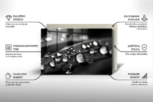 Tabla de cortar de vidrio Gotas de rocío sobre las hojas