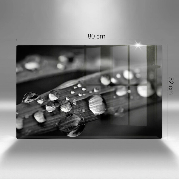 Tabla de cortar de vidrio Gotas de rocío sobre las hojas