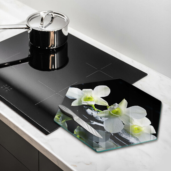 Tabla de cortar de vidrio Flores blancas en agua zen