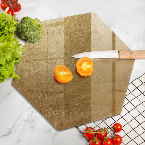 Tabla de cortar de vidrio Fondo de textura dorada