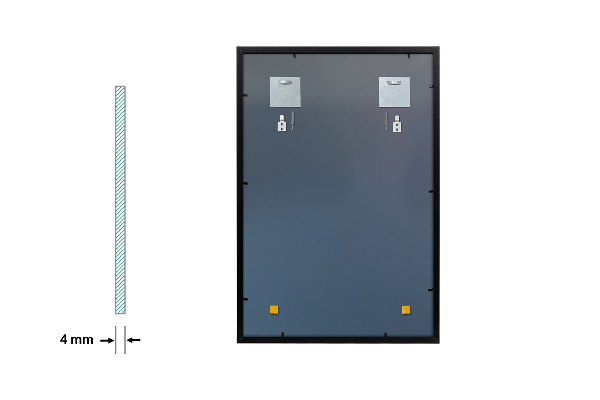 Rectangular espejo con marco negro encima del sofá 70x50 cm
