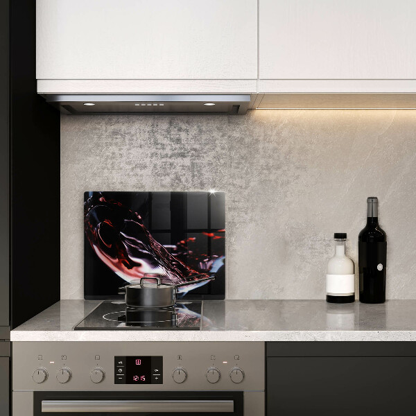 Cubre vitrocerámica Una copa de vino tinto