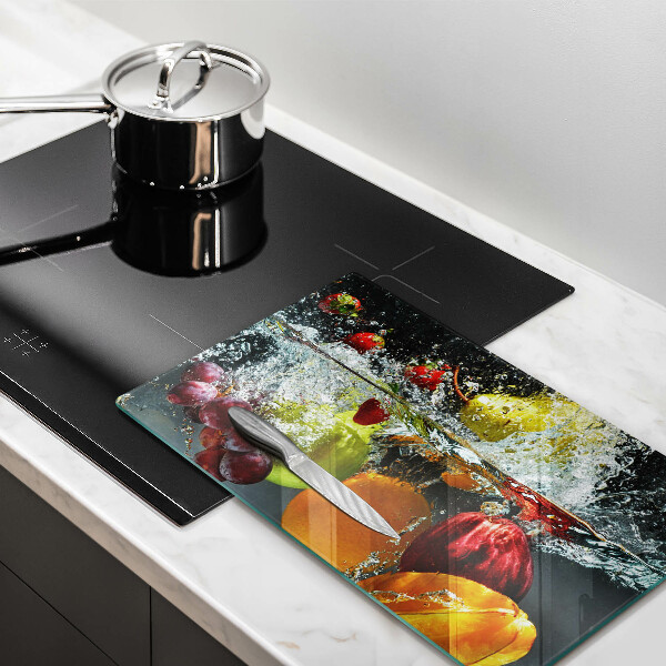 Cubre vitrocerámica Fruta jugosa en agua.