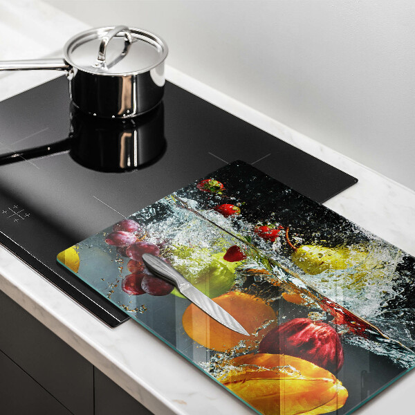 Cubre vitrocerámica Fruta jugosa en agua.