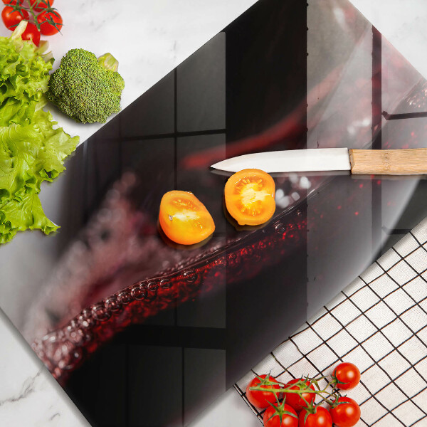 Cubre vitrocerámica Vino tinto en una copa