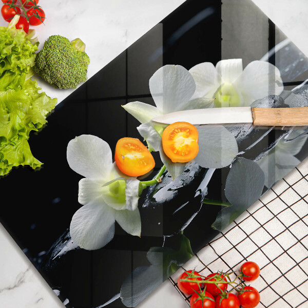 Cubre vitrocerámica Flores blancas en agua Zen.