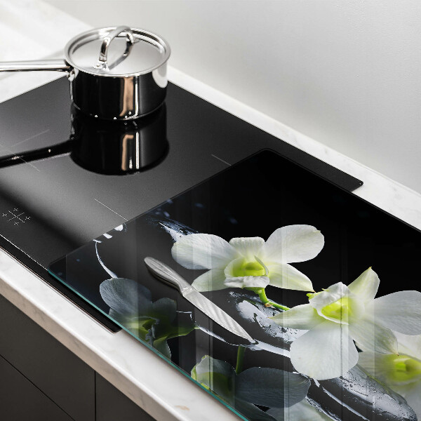 Cubre vitrocerámica Flores blancas en agua zen