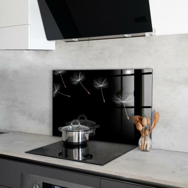 Paneles de vidrio para la cocina Dientes de león en el viento