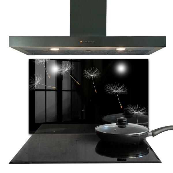 Paneles de vidrio para la cocina Dientes de león en el viento