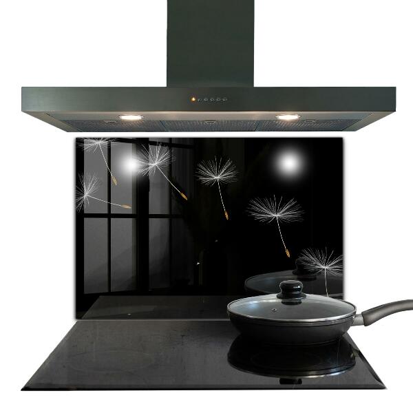 Paneles de vidrio para la cocina Dientes de león en el viento