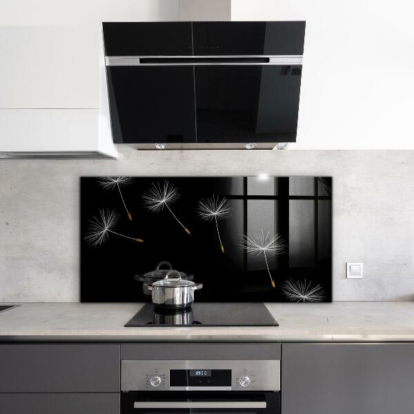 Paneles de vidrio para la cocina Dientes de león en el viento