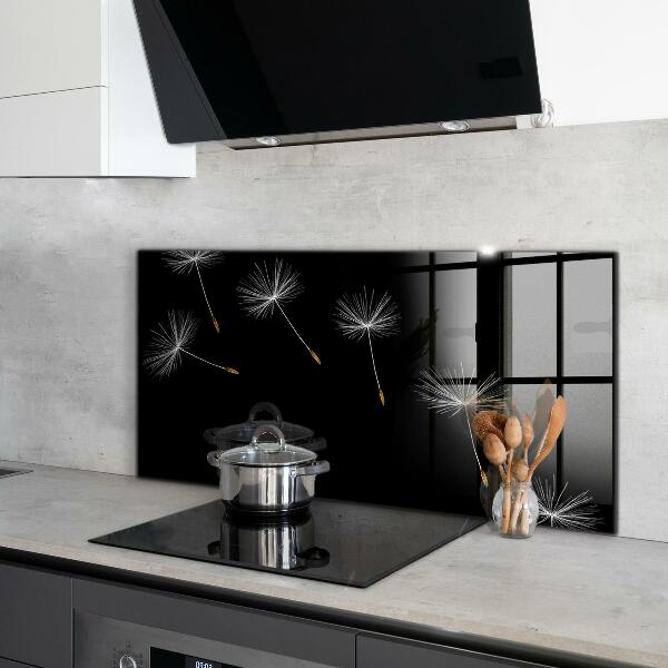 Paneles de vidrio para la cocina Dientes de león en el viento