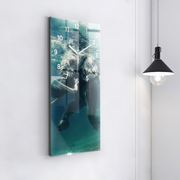 Reloj vertical Elefante flotante en el océano - espejomat.es