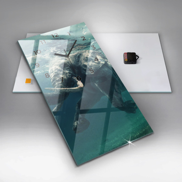 Reloj vertical Elefante flotante en el océano - espejomat.es