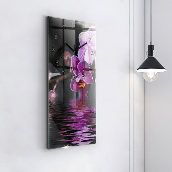 Reloj de vidrio vertical Flor de orquídea sobre el agua - espejomat.es