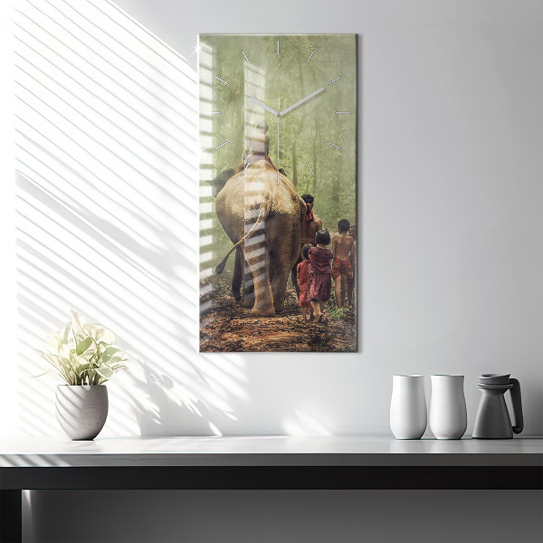 Reloj de vidrio vertical Niños guiando a un elefante - espejomat.es