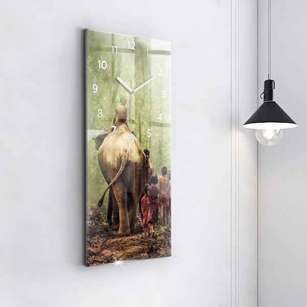 Reloj de vidrio vertical Niños guiando a un elefante - espejomat.es