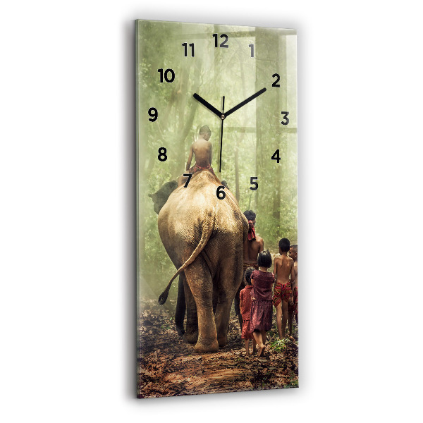 Reloj de vidrio vertical Niños guiando a un elefante - espejomat.es