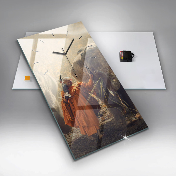 Reloj de cristal vertical Monje guiando elefantes - espejomat.es