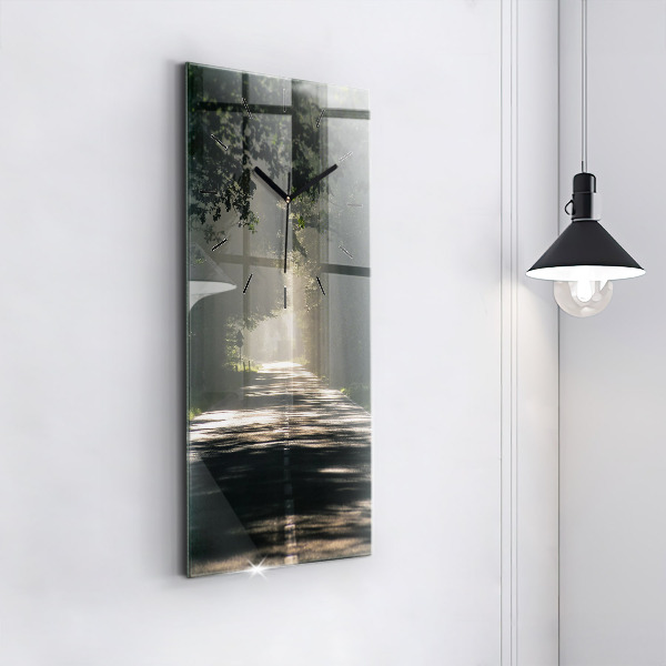 Reloj de vidrio vertical Carretera forestal y rayas de sol - espejomat.es