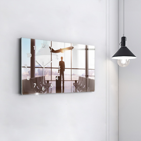 Reloj horizontal Hombre en el aeropuerto