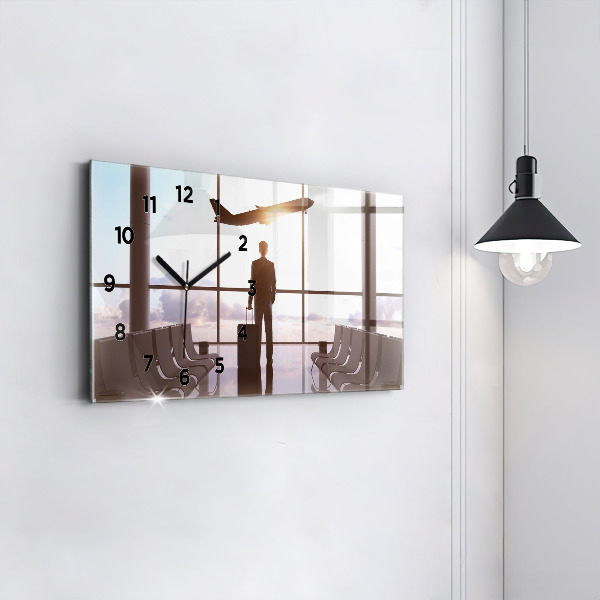 Reloj horizontal Hombre en el aeropuerto