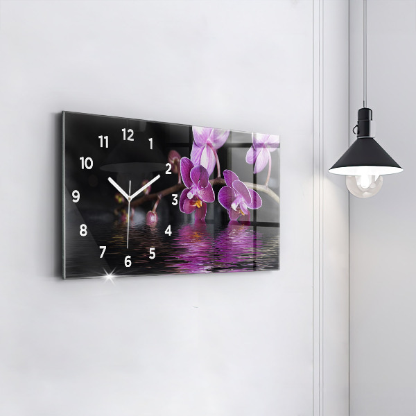 Reloj horizontal Flor de orquídea sobre el agua