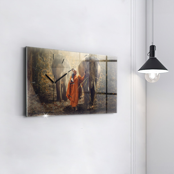 Reloj horizontal Monje guiando elefantes