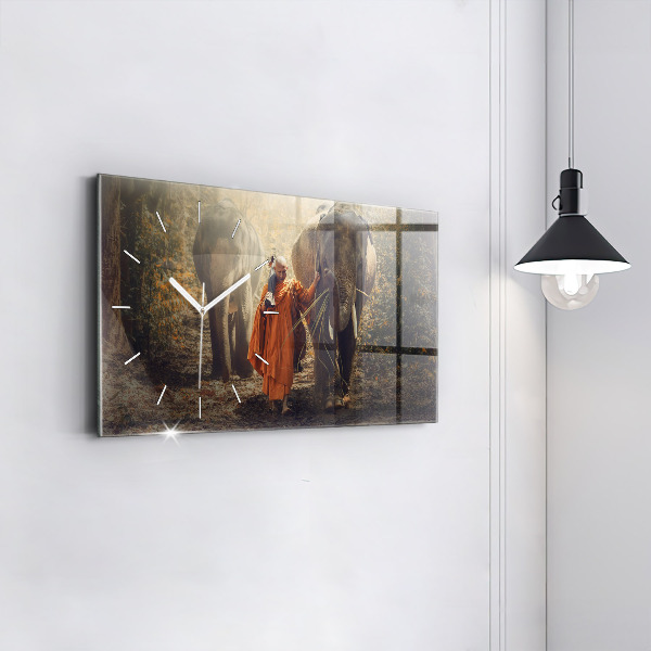 Reloj horizontal Monje guiando elefantes