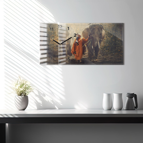 Reloj horizontal Monje guiando elefantes