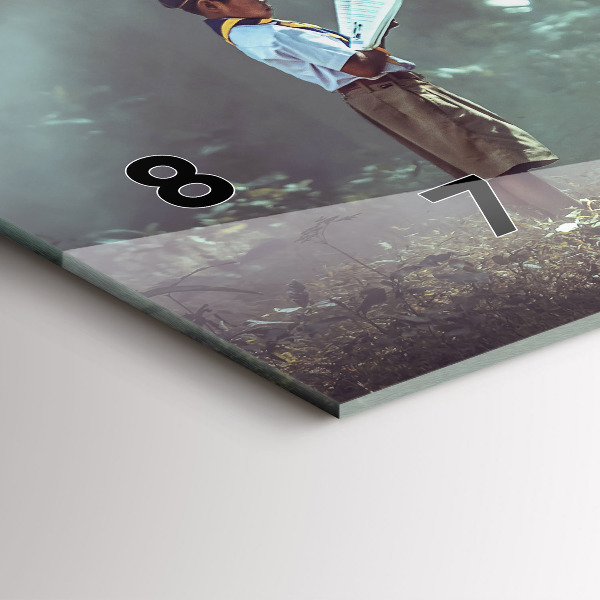 Reloj horizontal Niño leyendo un libro