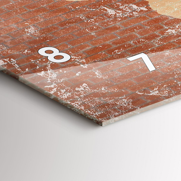 Reloj horizontal Mapamundi sobre un ladrillo