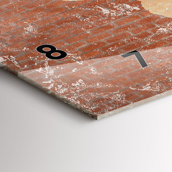 Reloj horizontal Mapamundi sobre un ladrillo