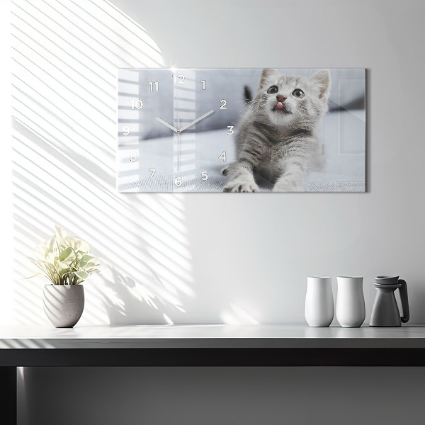 Reloj horizontal Gato en un sofá