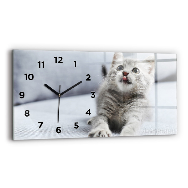 Reloj horizontal Gato en un sofá