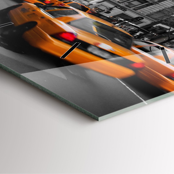 Reloj cuadrado Manhattan y taxis