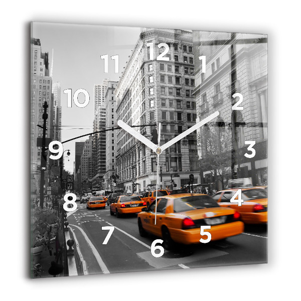 Reloj cuadrado Manhattan y taxis