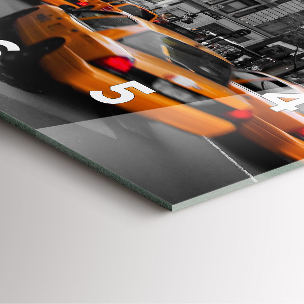 Reloj cuadrado Manhattan y taxis